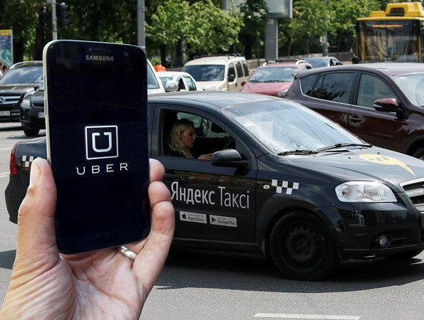Uber и "Яндекс" объединяют бизнес по онлайн-заказу поездок в СНГ