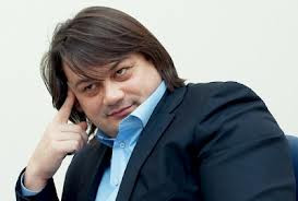 Николай Лагун снова покупает (Астра Банк)